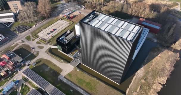 Amsterdam, 18th of March 2022, The Netherlands. Modern datacenter building data internet technology business center structure tower. Hosting, telecommunication and networking center. — Stock Video