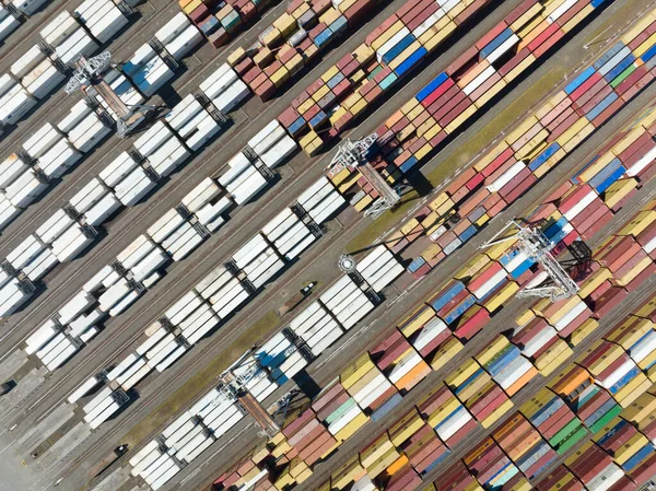 Rotterdam, 18th of april 2022, The Netherlands. Container terminal logistic ship loading and unloading of import and export dock commercial harbour aerial drone view. freight business — стоковое фото