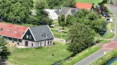 Farmers protest in The Netherlands, dutch flag upside down. Protest actions by different groups of farmers. Goverenment wants to limit livestock farming to solve the nitrogen crisis.