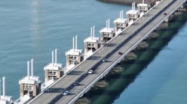 The Delta Works are a water flood defense system, in the Netherlands, to protect against high water from the sea of, in particular, the provinces of Zeeland. Oosterschelde barrier.