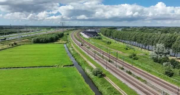 Dutch Train Green Open Grassland Landscape Green Alternative Sustainable Transportation — Stockvideo