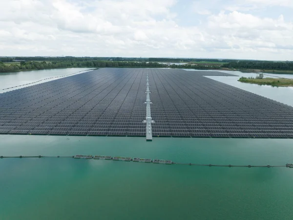 Clrean sustainable energy generation using solar panels on a large pond in The Netherlands, Druten. Energy transition