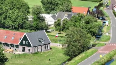 Farmers protest in The Netherlands, dutch flag upside down. Protest actions by different groups of farmers. Goverenment wants to limit livestock farming to solve the nitrogen crisis.