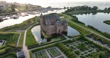 Medieval stronghold castle restored heritage culture monument for touristic museum purpose. Aerial overhead view. Dutch Holland fortification landmark full of history. Europe