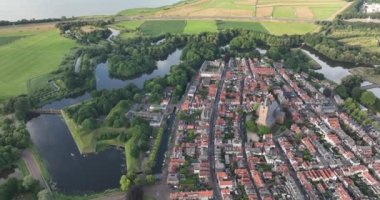 Fortified ancient old historic town of Naarden Vesting overhead aerial drone view of monumental ancient fort at the Zuiderwaterlinie medieval fortress defenisive vest landmark.