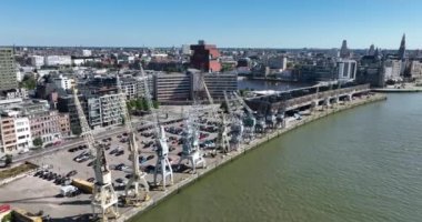 Antwerpen , 9th of August 2022, Belgium. MAS - Museum aan de Stroom and city skyline and Loodswezen Schipperskwartier. Downtown city center aerial drone overview.