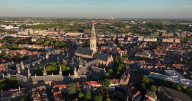 The Abbey Tower 90.5 meter high church tower in the abbey complex in Middelburg. Nicknamed the Lange Jan. Amoung tallest church towers in the Netherlands. Middelburg urban city overview in Zeeland