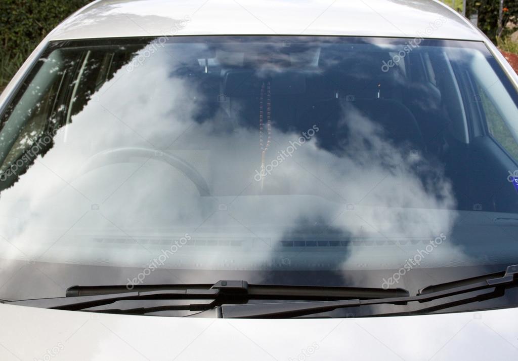 Front View Of Car Windshield And Windscreen Wiper Blades