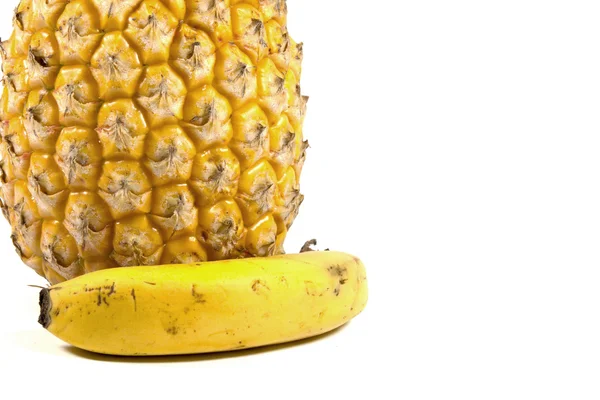 Izolované čerstvý ananas a bannana na bílém pozadí — Stock fotografie