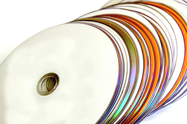 Close-up de coleção de discos compactos laranja e branco — Fotografia de Stock