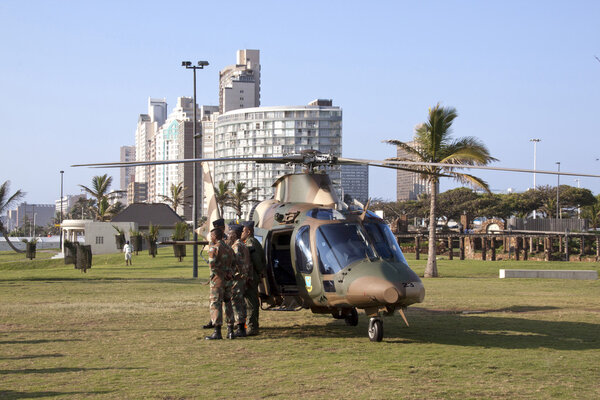Helicopter and Military Prsonel on Beach Front In Durban