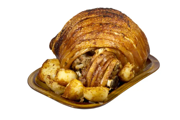 Cuisse de porc rôtie aux pommes de terre croustillantes — Photo