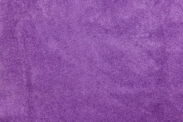 Tela de terciopelo púrpura con textura suave y suave Imagen de archivo
