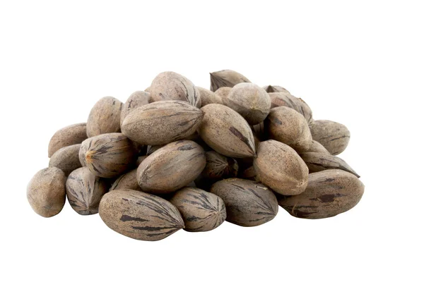 Hromada nově vydané pekanové ořechy na bílém pozadí — Stock fotografie