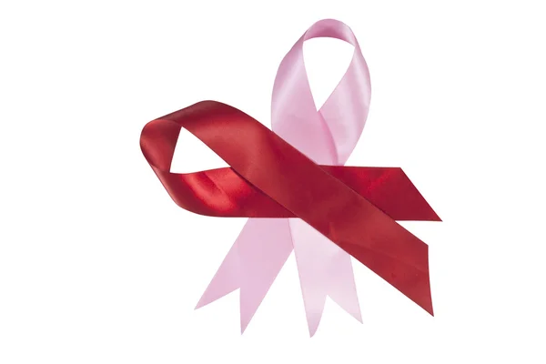 Červené a růžové stužky na podporu aids a awaren rakoviny prsu — Stock fotografie