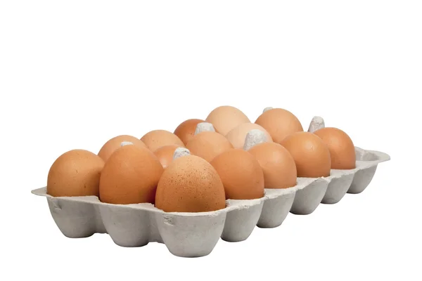 Vue latérale des œufs frais dans la boîte à œufs en carton — Photo