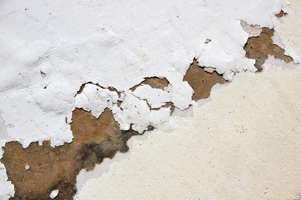 Bubbling Paint on Exterior Wall due to Neglect Stock Photo