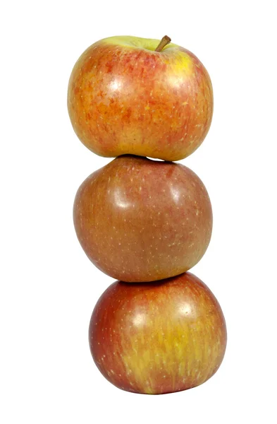 Torre de tres manzanas rojas sobre fondo blanco —  Fotos de Stock
