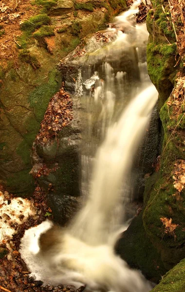 Night winter view to icicles and icy boulders into the stream. — Stock Photo, Image