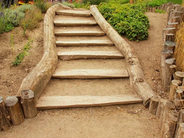 Old wooden stairs in traditional garden, tourist footpath — Stock Photo, Image