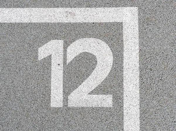 Numer Dwanaście Pomalowany Miękkiej Gumowej Powierzchni Dwunasty Punkt Skoki Hopscotch — Zdjęcie stockowe