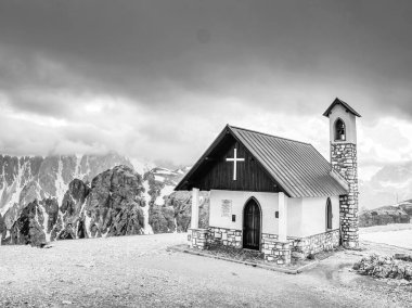Tre Cime  tour. Mountain chapel near Tre Cime di Lavaredo in Dolomites Alps Italy. BW, Black and white,