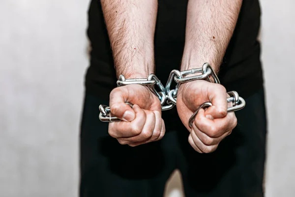 Chained Human Hands Sticking Out Prison Gray Wall Selective Focus — Stock Photo, Image
