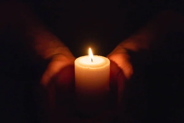 Hands Holding Burning Candle Dark Heart Selective Focus Black Background — Stock Photo, Image