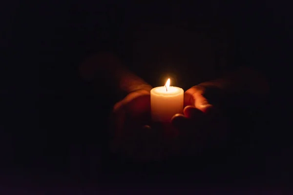 Hands Holding Burning Candle Dark Heart Selective Focus Black Background — Stock Photo, Image