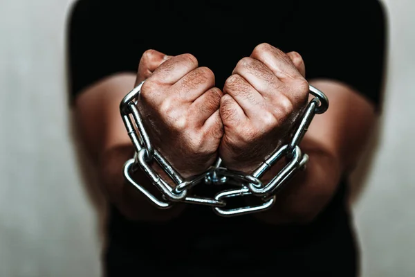 Chained Human Hands Sticking Out Prison Gray Wall Selective Focus — Stock Photo, Image