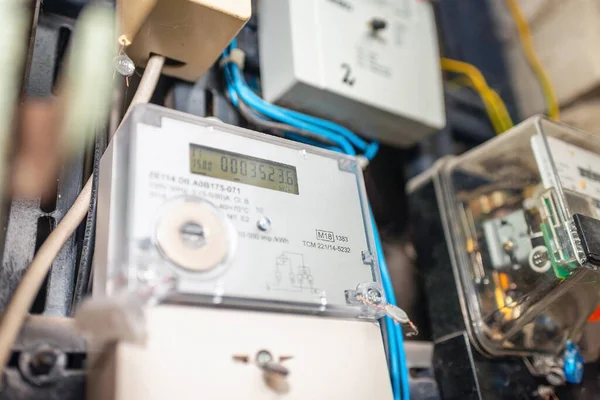 Two smart electric power meter counter measuring power usage.Close-up of modern smart grid residential digital power supply meter.Indoors shot.Selective focus.