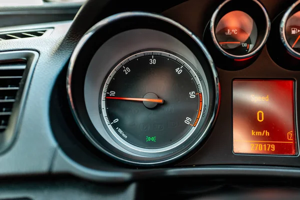 Modern car speedometer,odometer,tachometer and illuminated dashboard. car dashboard modern automobile controlilluminated panel speed display.Car instrument panel.Close up.Selective focus.