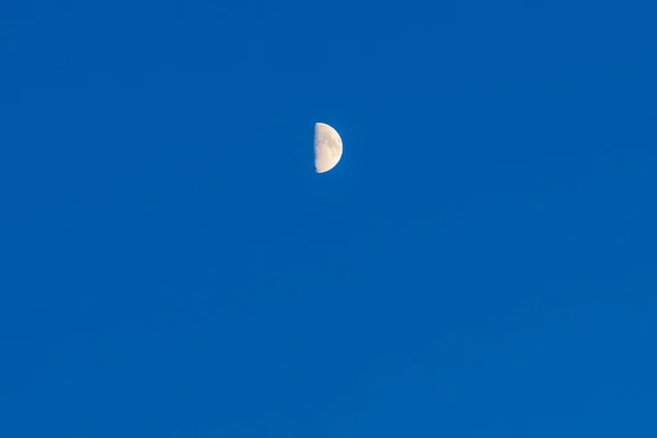 Small Moon Blue Sky Glowing Background Moon Illuminated Sun — Stock Fotó
