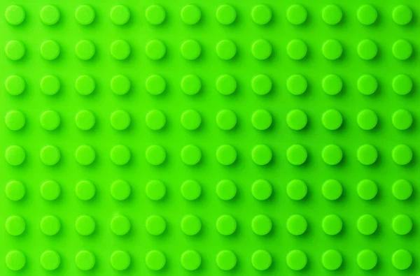 Green plastic construction background