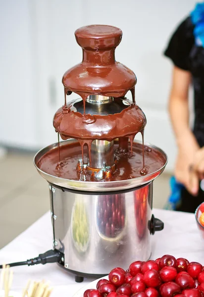 Chocolate fountain for dipping fruits and snacks — Stock Photo, Image