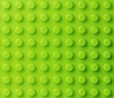 Green plastic construction background