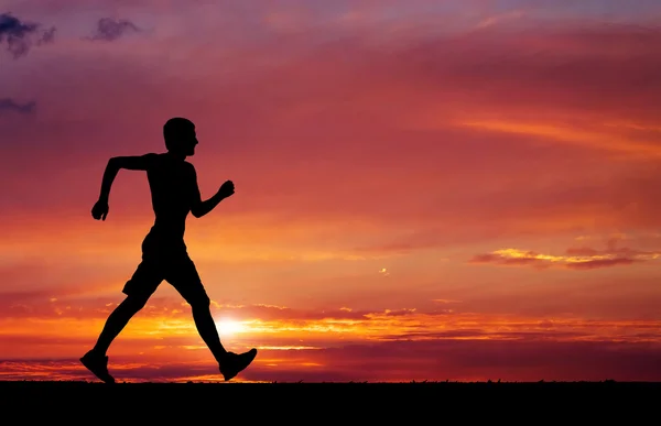 Pedestrianism. Silhouette of sportsman. — Stock Photo, Image