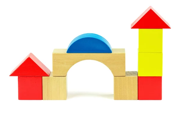 House made from toy wooden colorful building blocks — Stock Photo, Image