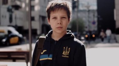 Teenage ukrainian boy looking at the camera
