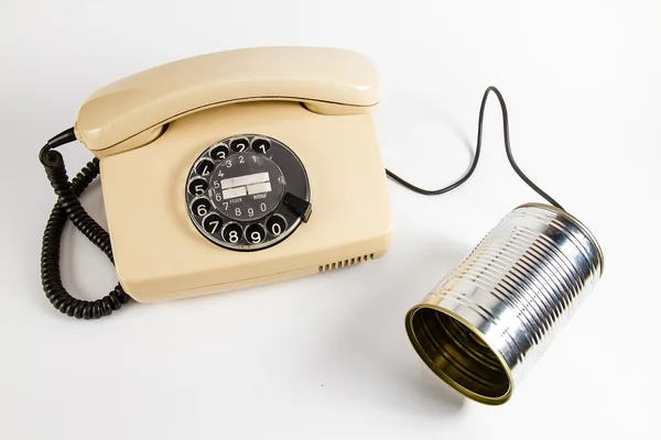 Телефон, привязанный струной к банке Лицензионные Стоковые Фото
