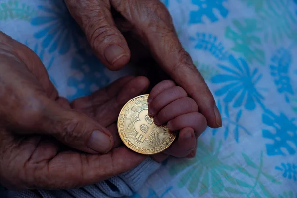 Captures Moment Grandmother Giving Hand Hand Bitcoin Token Newborn Son Royalty Free Stock Photos