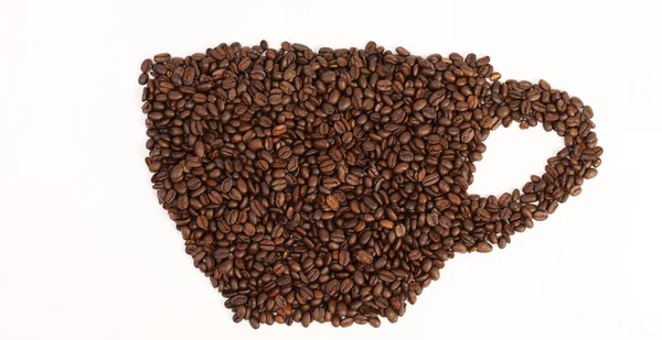 Cup of coffee beans on white background — Stock Photo, Image