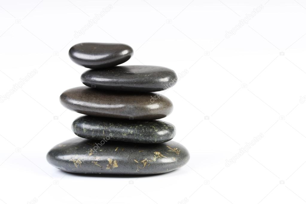 Balancing rocks on white background