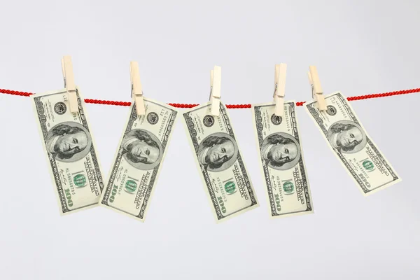 Money american hundred dollar bills hanging on laundry line — Stock Photo, Image