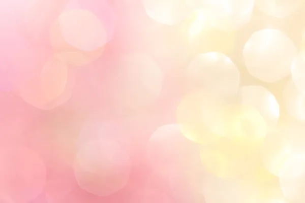 Gold and pink abstract bokeh lights, defocused background — Stock Photo, Image