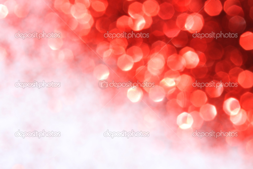 Shiny light effects with blurry lights and glittering snowflakes  and white place for text
