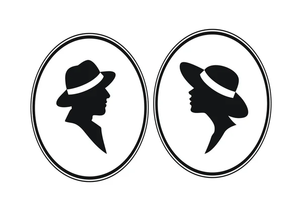 Male and female in hats silhouettes- gender symbols — Stock fotografie