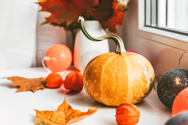 Autumn decoration on the windowsill in the style of hygge — Stock Photo, Image