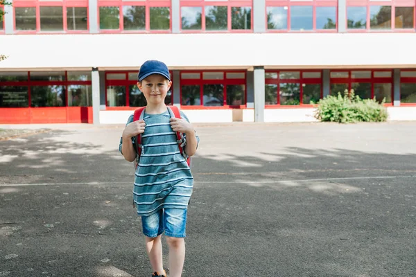 Charming European Boy Backpack His Back Cap Walks School Children — стоковое фото