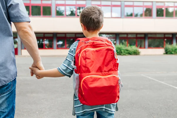 School Concept Dad Walks His Son Backpack His Back School — Fotografia de Stock